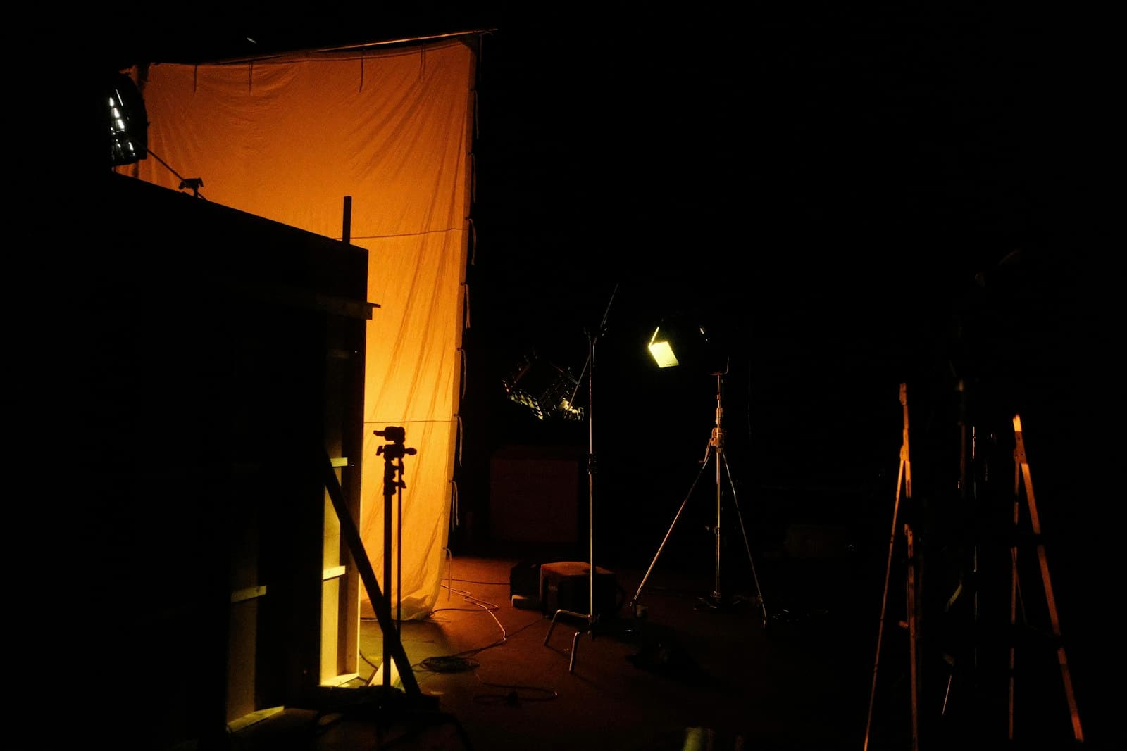 Cinematic dark studio with atmospheric lighting on a film set
